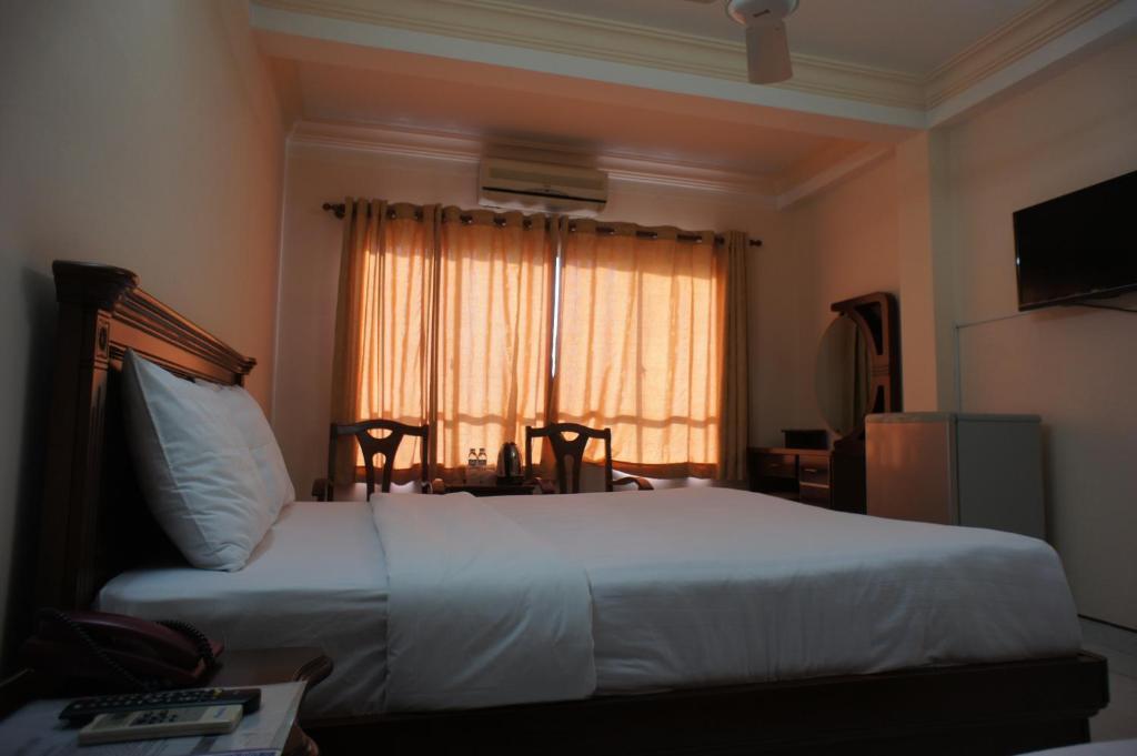 Elegant Inn Cidade de Ho Chi Minh Quarto foto