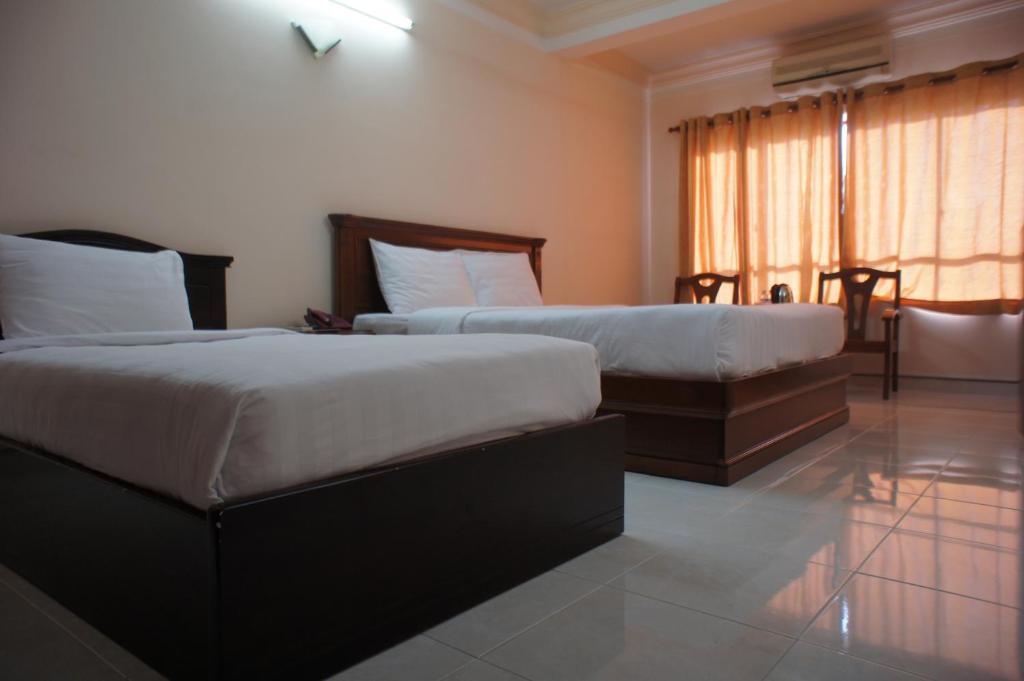 Elegant Inn Cidade de Ho Chi Minh Quarto foto